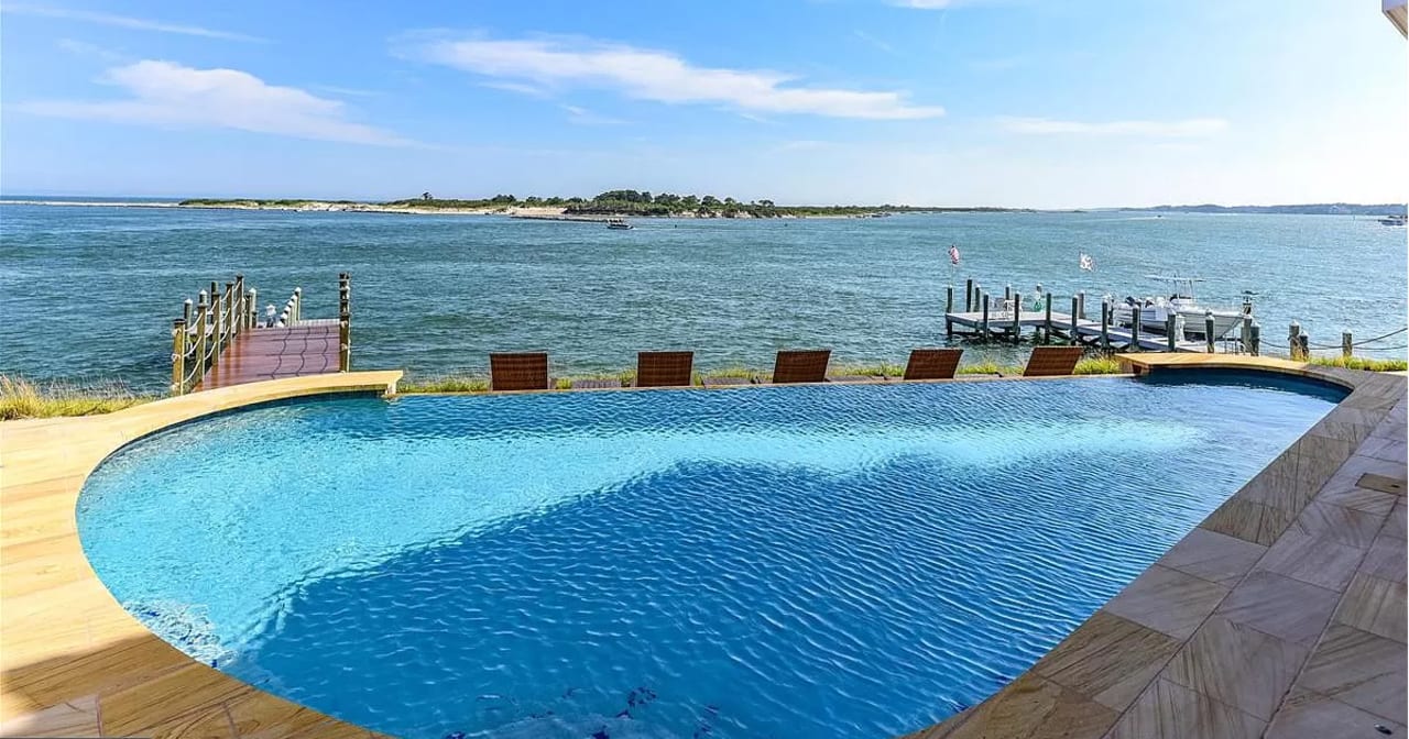 MD Beach Homes & Condos w/ Pool inception-app-prod/NTBmZTc1MmItNWRkZi00MWQzLThkMWMtMWYwNzc2YjIzODhi/content/2021/06/CoastalMDBeachHomesCondosw-PoolsFeature1200x6303.jpg