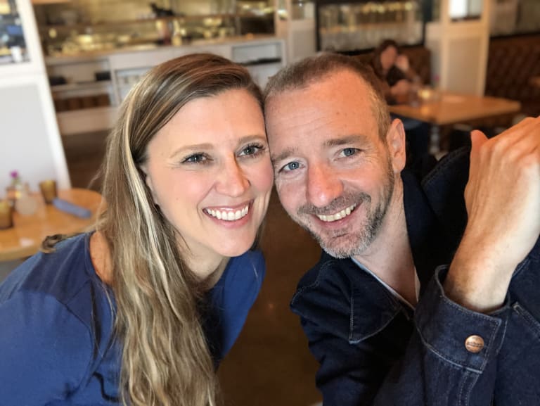Sean and Steavy Carter dining together at a restaurant — captured mid-conversation.