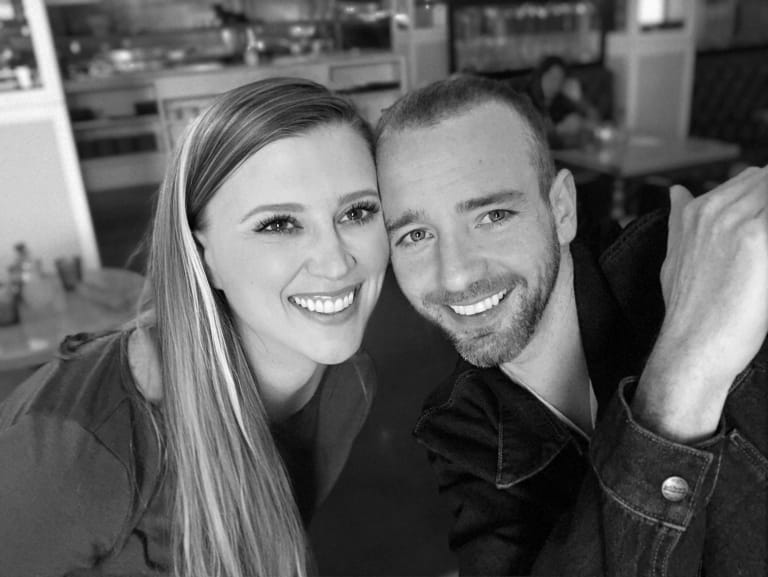 Black and white photo of Sean and Steavy at a restaurant — relaxed and stylish.