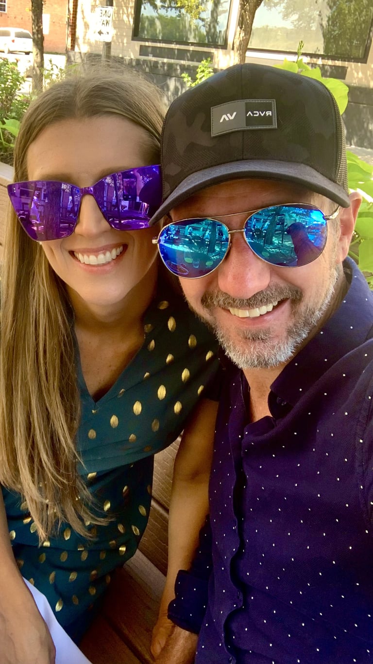 Dressed-up photo of Sean and Steavy wearing mirrored sunglasses and smiling — stylish and celebratory brand vibe.