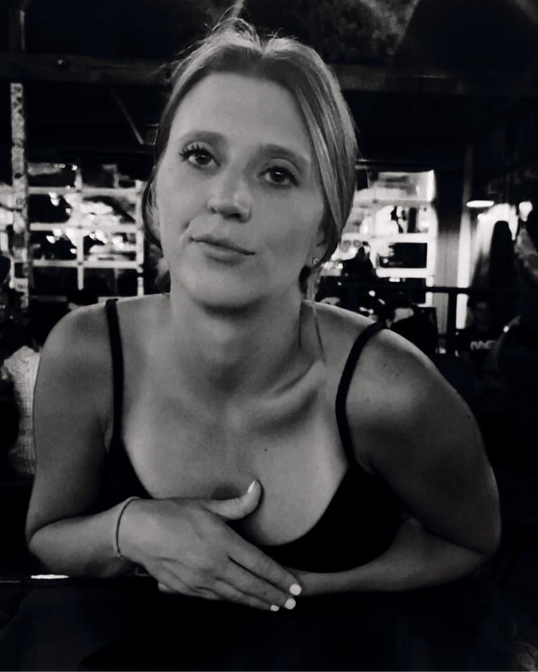 Black-and-white photo of Steavy Carter making a sassy face at the Truck Yard in Dallas — confident and fun personality branding.