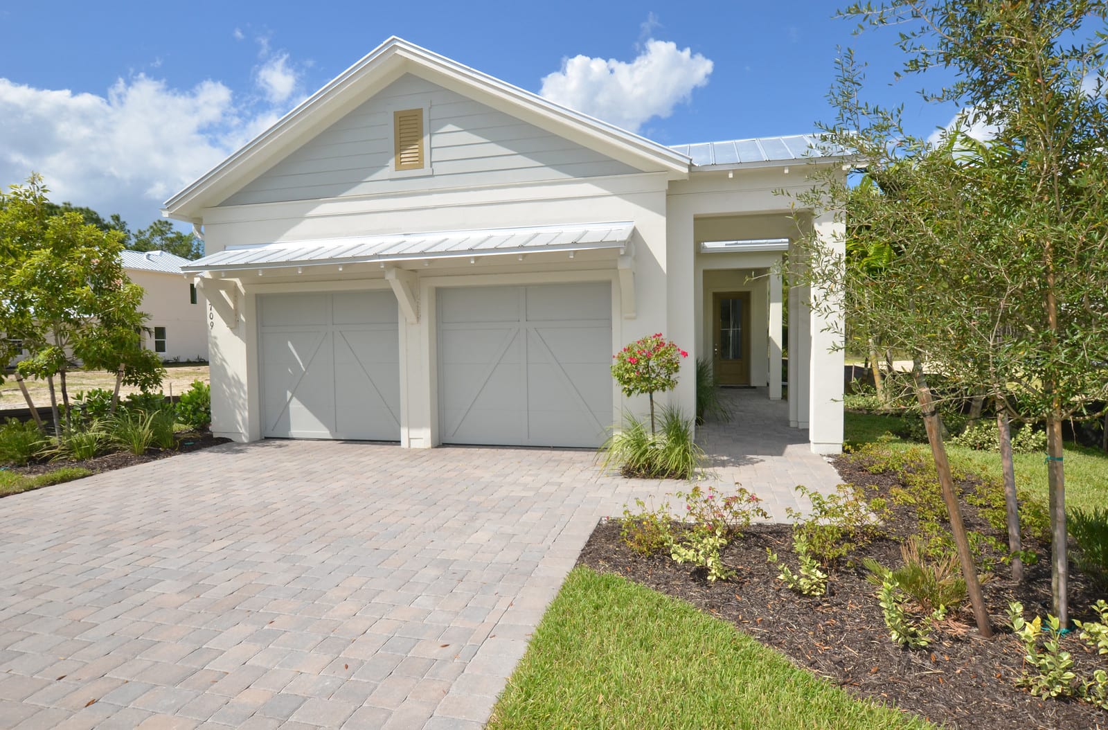 Naples Reserve New Construction Model Home Is A Must See! inception-app-prod/MzA4MDg4OWYtYzkzMi00MTQ3LTkwYWMtZGU0MTc0NjVkYTg5/content/2016/11/Mindy Sylvester Naples Reseve Ext-2.jpg
