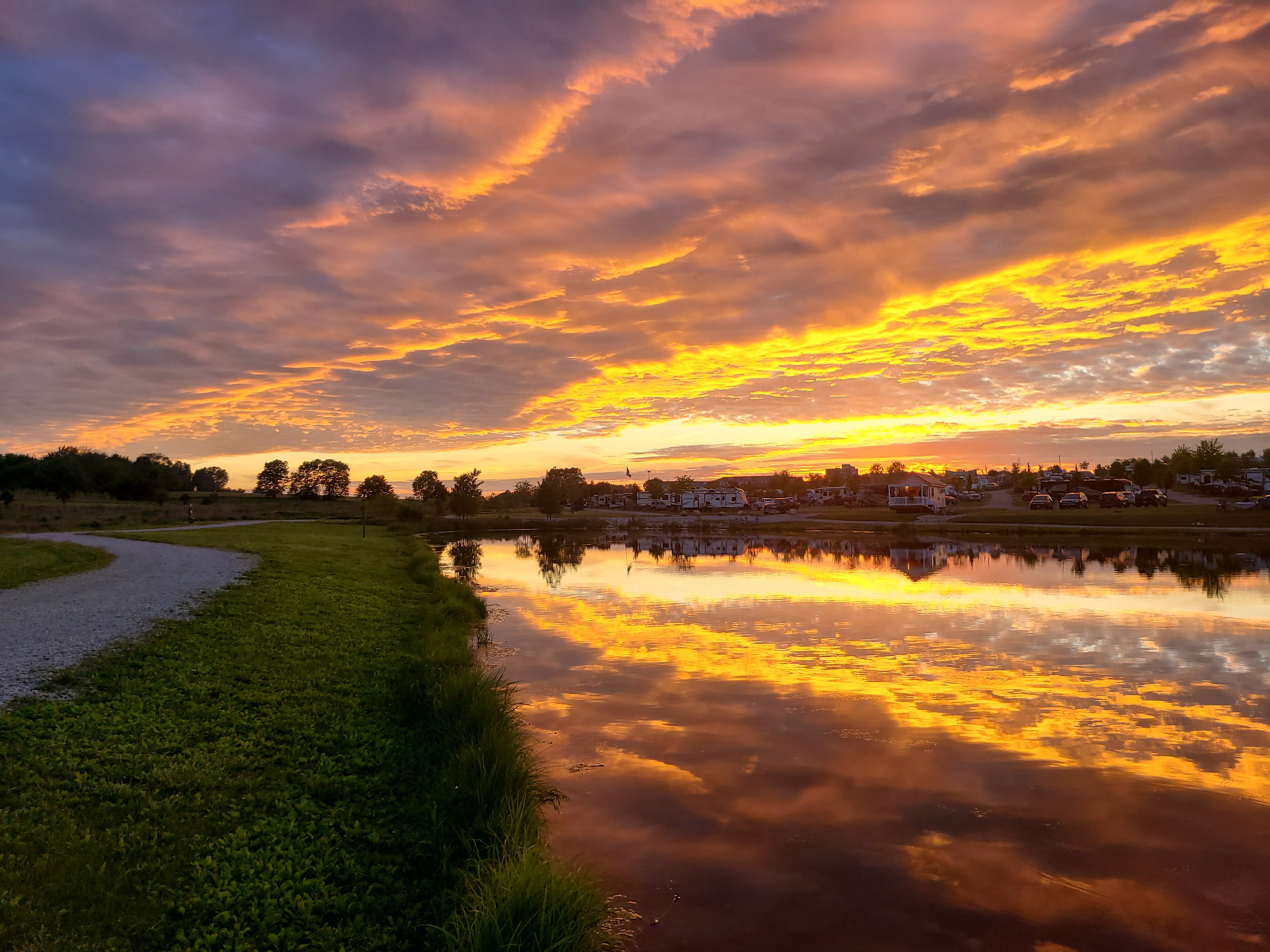 Mirrored sunset across a lake