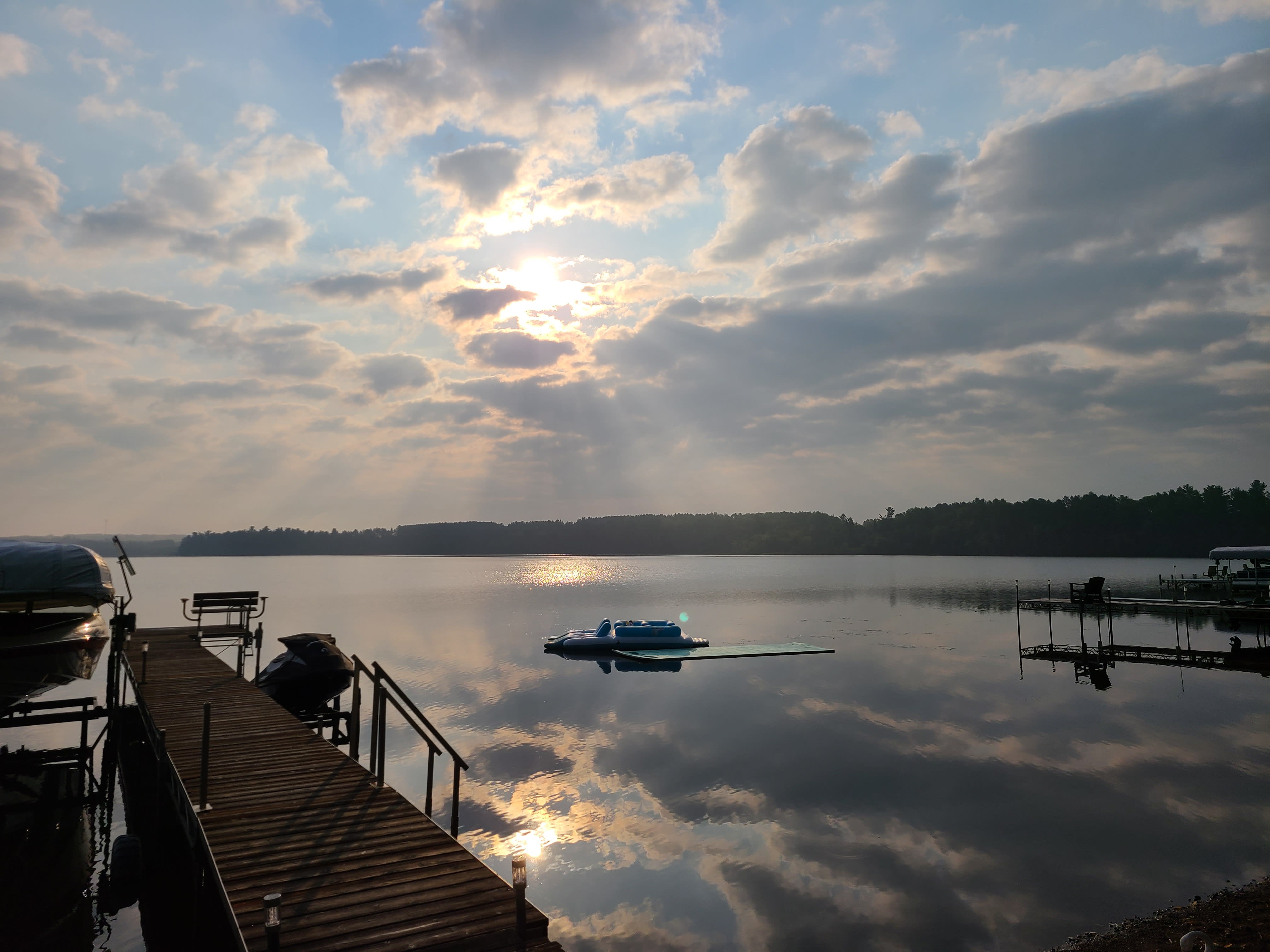 Lake homes up I-35 Mirrored sunrise over moosehead lake