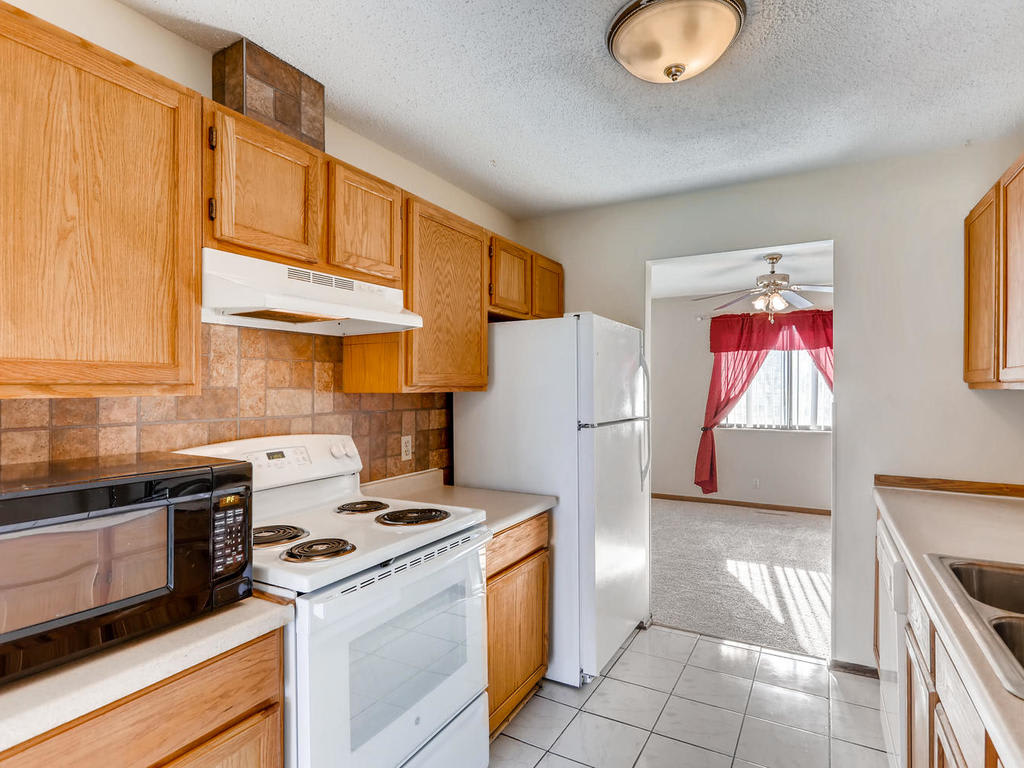 inception-app-prod/NTdjYTA5NzgtMjdjYS00OTRhLWJlM2MtYmQwMjgxMDdlMDRh/content/2018/11/7541 62nd CT N Minneapolis MN-006-5-Kitchen-MLS_Size.jpg