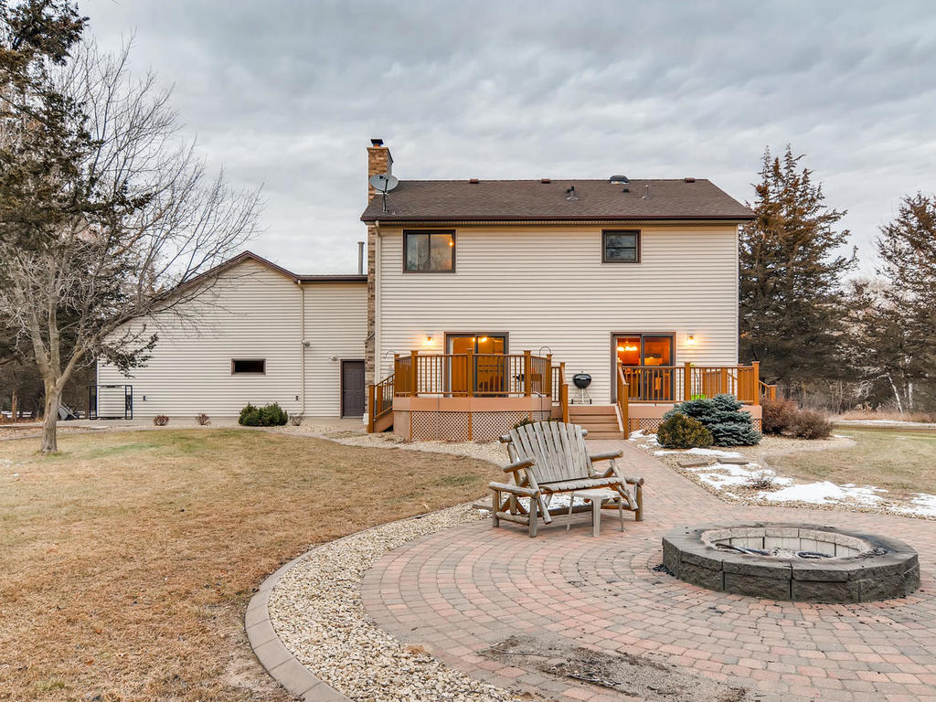 Recently Reduced Ramsey Home & Acreage inception-app-prod/NTdjYTA5NzgtMjdjYS00OTRhLWJlM2MtYmQwMjgxMDdlMDRh/content/2019/01/8900 173rd Ave NW Ramsey MN-026-27-Back Yard-MLS_Size.jpg