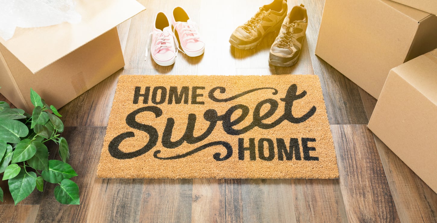 inception-app-prod/NjQ2ZGIzMmMtMmZhZS00ZDE0LThlZGQtMGNiZGJjMWFkZmRh/content/2020/07/home-sweet-home-door-mat-with-shoes.png