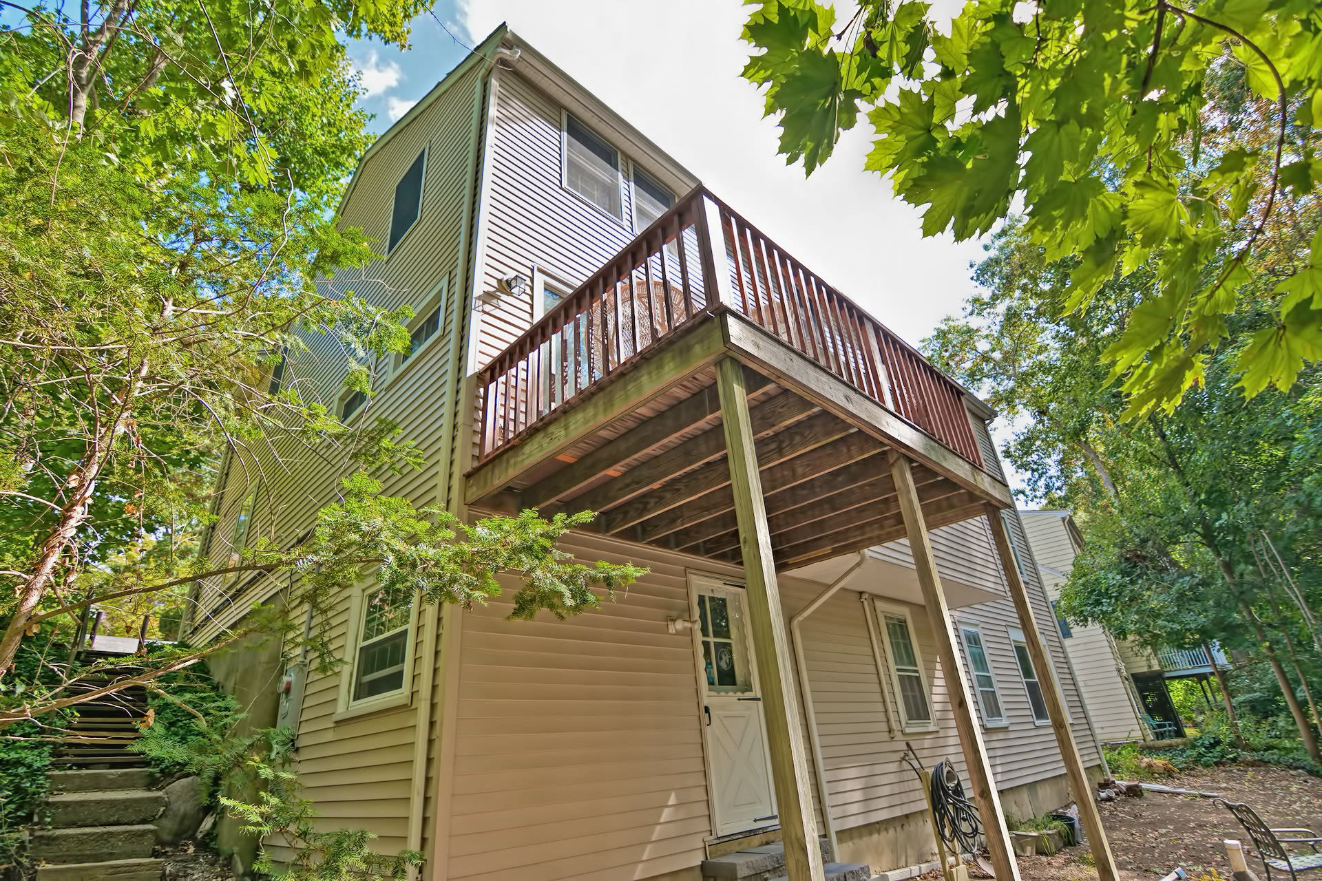 Tree top deck above patio