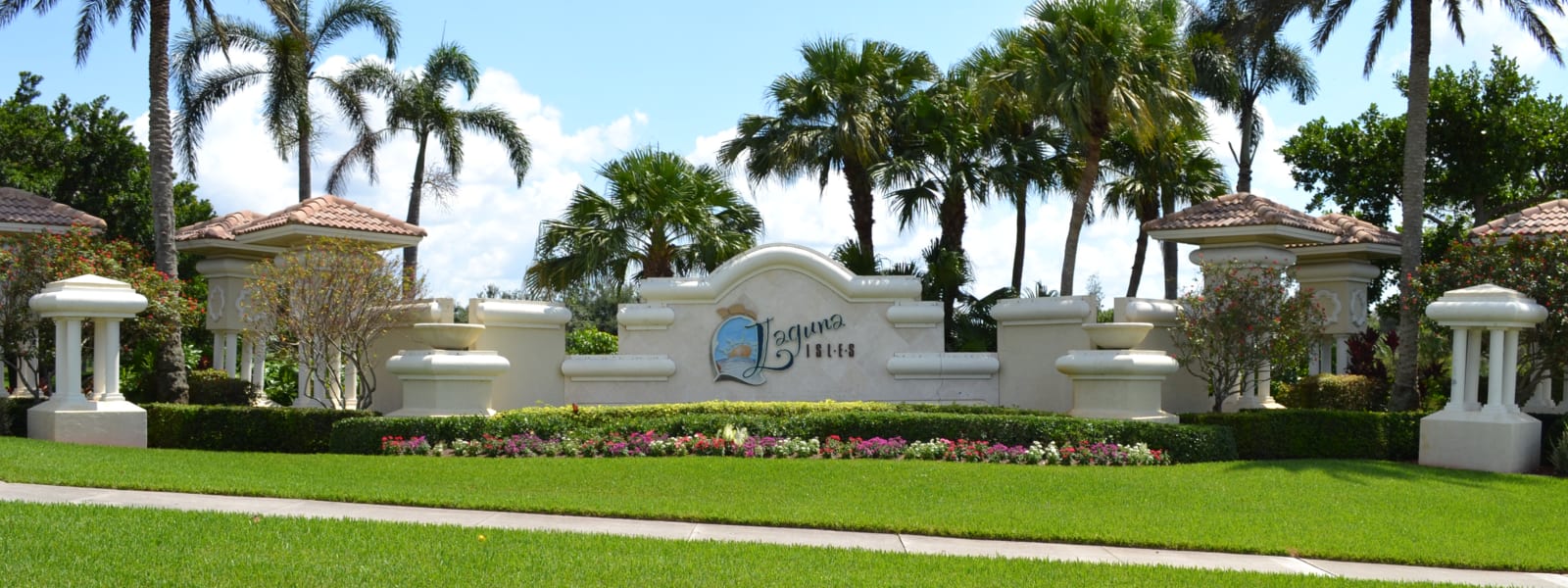 inception-app-prod/ODA4YzA4OTAtMGJmMy00ZWU3LWFhZTYtMjVlMGFhMWJiZjIz/content/2018/06/Laguna Isles Entrance_Cropped-2.png