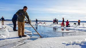Ice Harvesting for Summer Camp on Squam Lake inception-app-prod/ODZiMmU1ZmEtZjkzNC00YTZlLWI1ZWQtNWFlZmM5YmY1YTA4/content/2020/01/ice-harvest.jpg