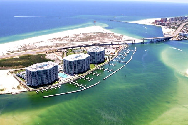 Featured Condo Community - Caribe The Resort of Orange Beach inception-app-prod/OTg3NWIzOGQtOGU3YS00OTY2LTlkNzktZDZmMTNmN2NlMGNl/content/2016/10/Caribe aerial1-2.jpg
