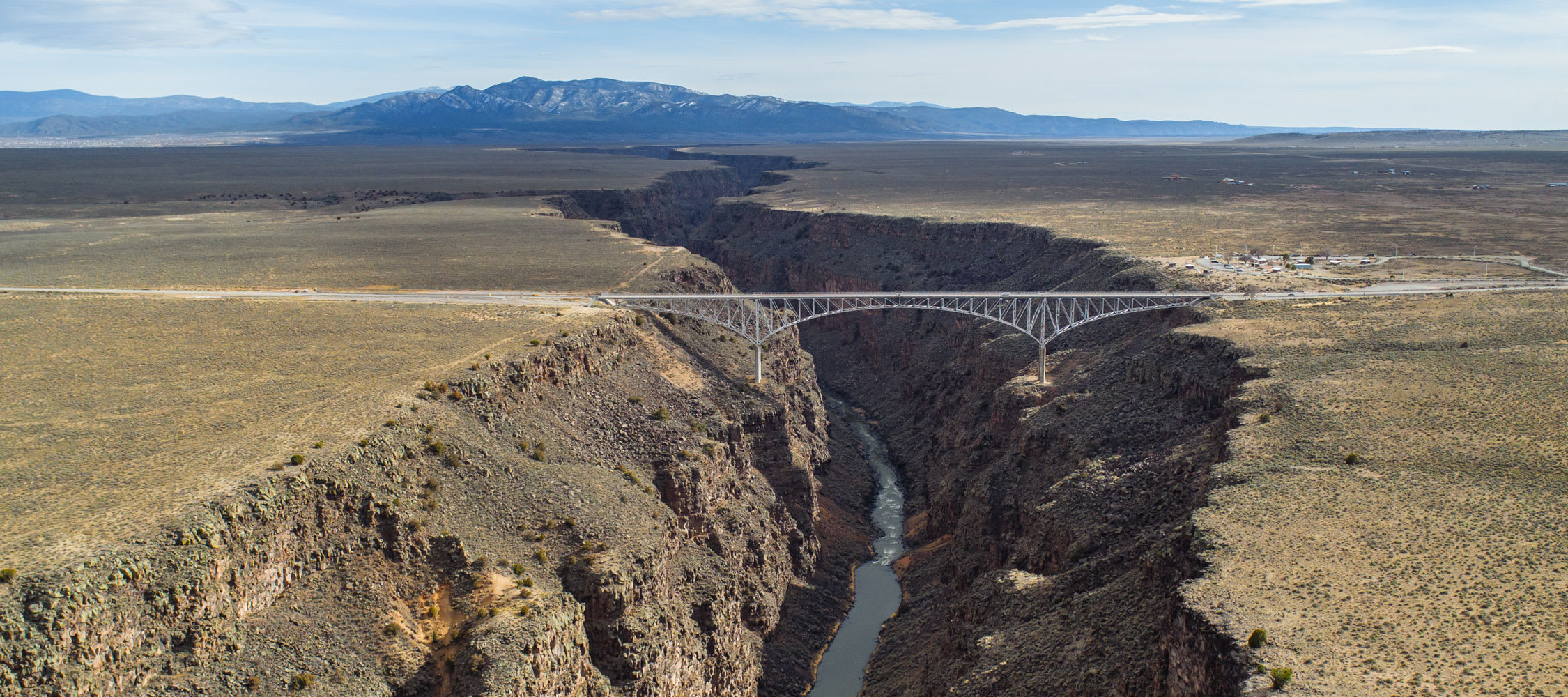 The Rio Grande Gorge Bridge: The Bridge to Nowhere inception-app-prod/YTFhMjY2NTctZTkwYS00NGRmLThjZTctNDFlNjg3MzNjNTI0/content/2023/09/1b5da0cd54288ab29da0b7eda1af1aba699fd435.jpg