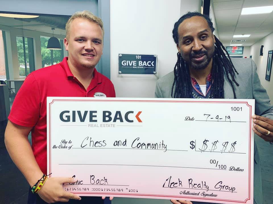 inception-app-prod/YmNiYjc4YjctMjU1OC00YWJhLThmOTYtZDA1N2ZmODcyMzkx/content/2019/07/Colby at Chess and Community.jpg