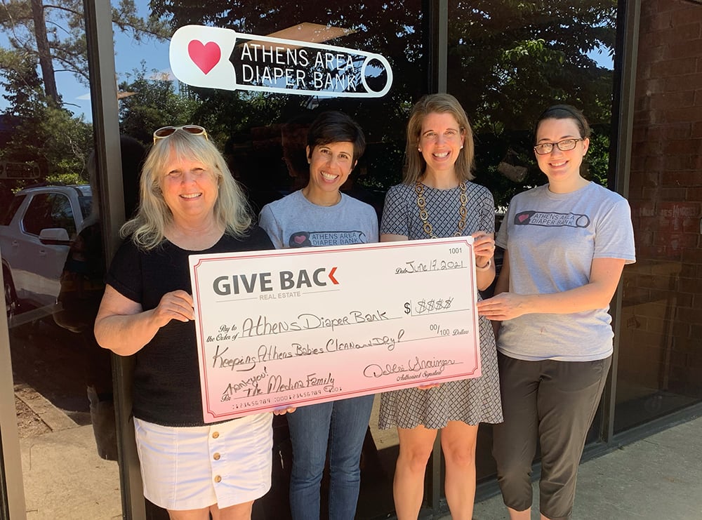 inception-app-prod/YmNiYjc4YjctMjU1OC00YWJhLThmOTYtZDA1N2ZmODcyMzkx/content/2021/06/Debbie at Diaper Bank Smaller.png