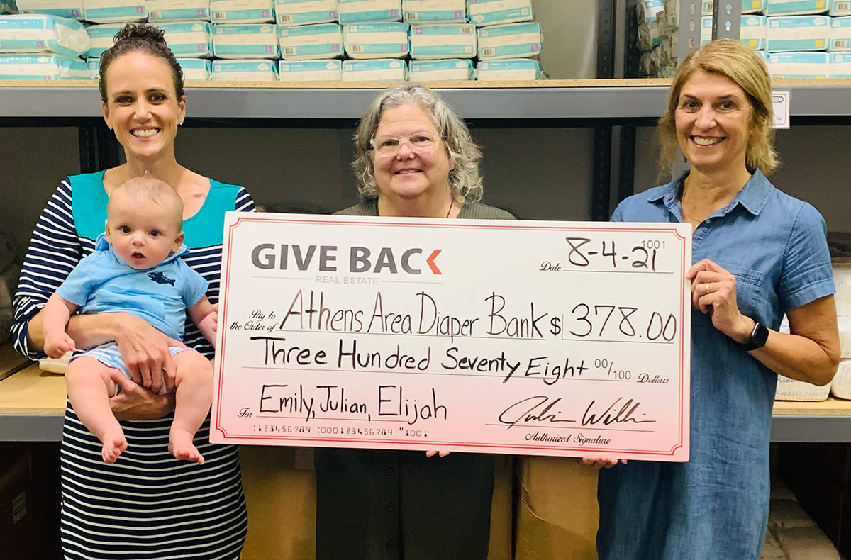 inception-app-prod/YmNiYjc4YjctMjU1OC00YWJhLThmOTYtZDA1N2ZmODcyMzkx/content/2021/08/Julian at Diaper Bank 2 smaller.png