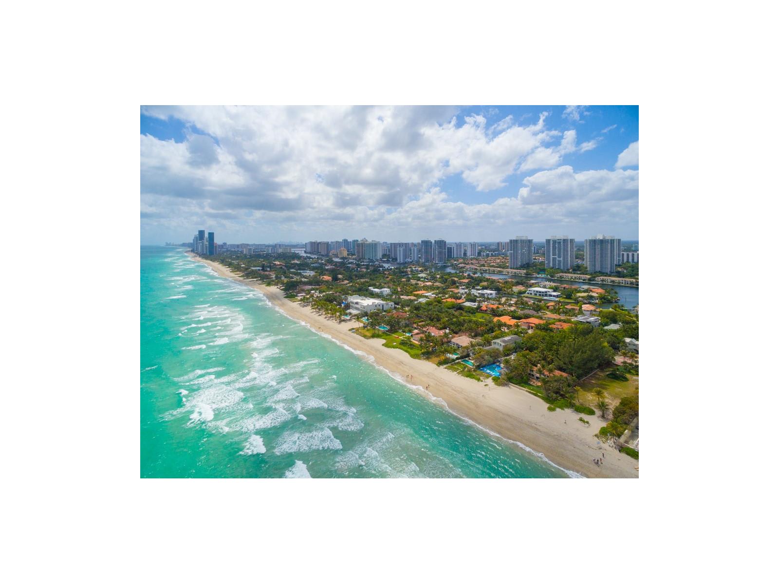 inception-app-prod/ZDI3ZDE3MjktNDM4Zi00YWViLTljMDMtNjlkYmUwZDRmZDE2/content/2017/03/Aerial Golden Beach.jpg