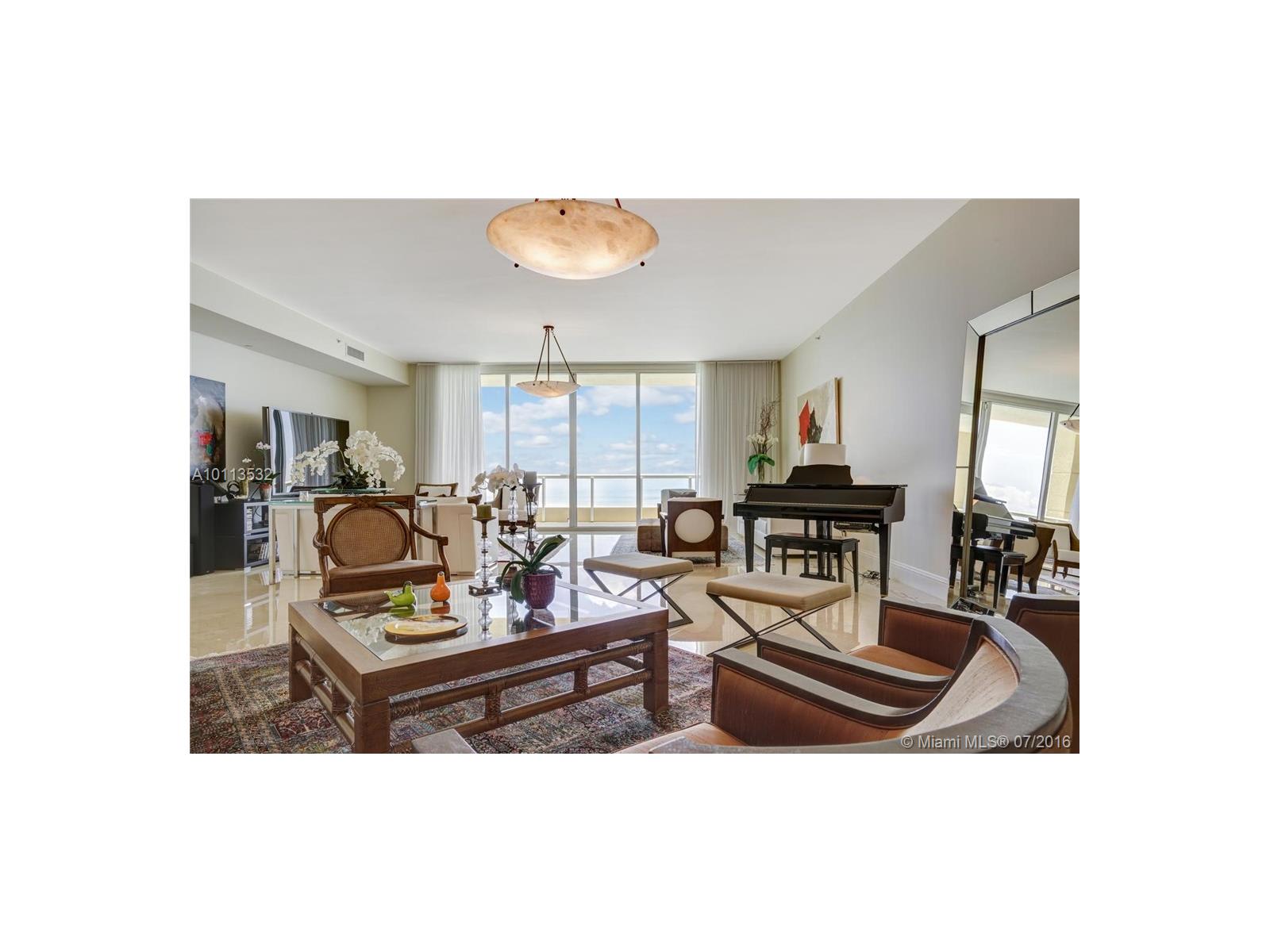 inception-app-prod/ZDI3ZDE3MjktNDM4Zi00YWViLTljMDMtNjlkYmUwZDRmZDE2/content/2017/07/Acqualina 4701 living room.jpg