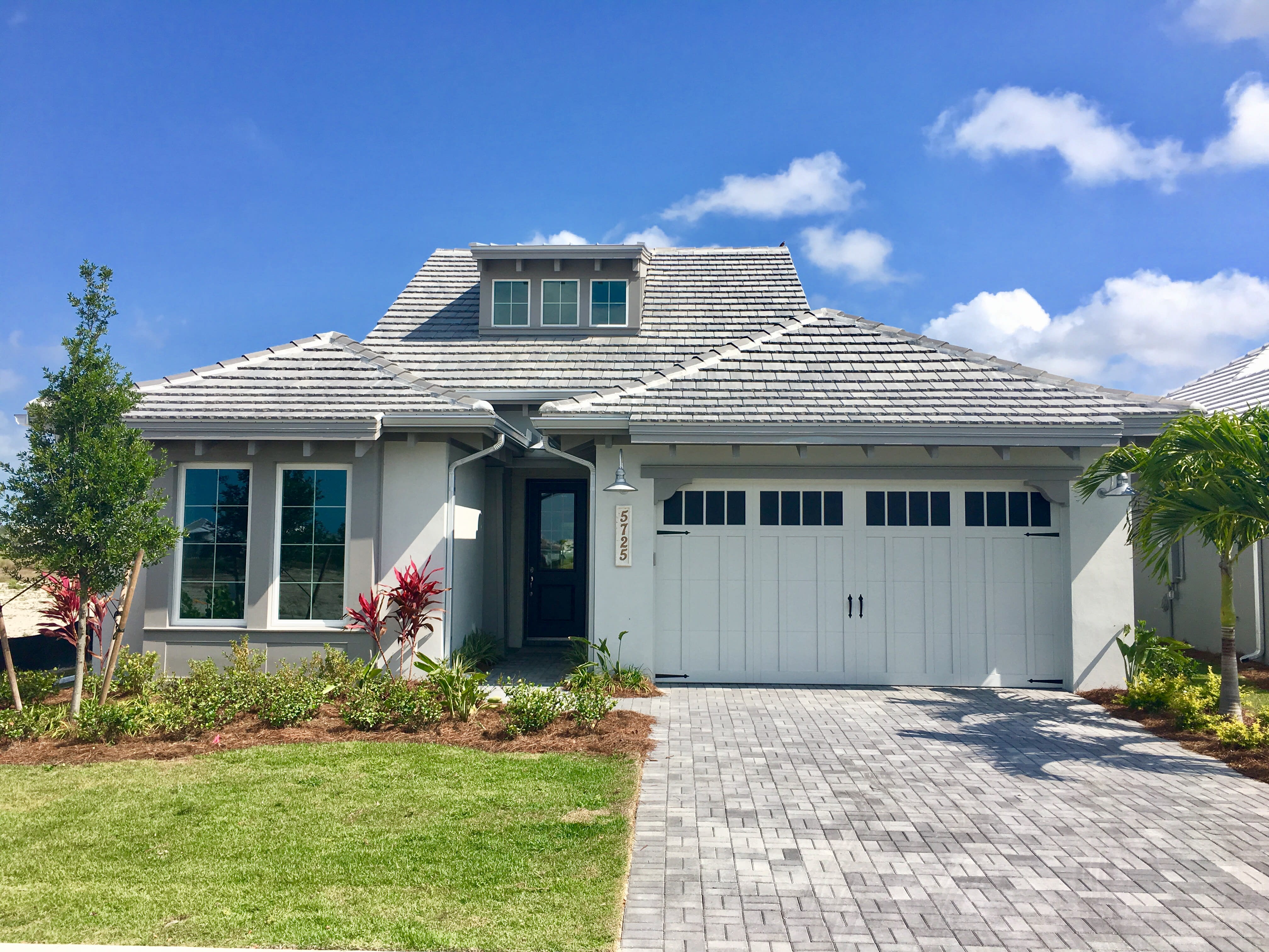 Move In Ready Homes inception-app-prod/ZDY2NzI4NjQtMzNlMC00NzFkLTk1YjUtNWYwZDc3ZjdiOGQ1/content/2017/08/Isles of Collier Naples Nordstrom Ext.jpg