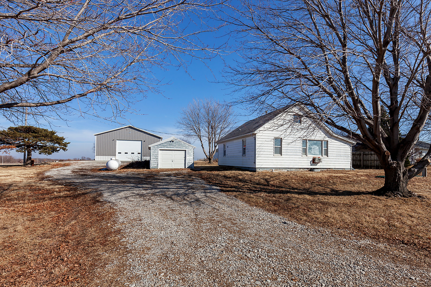 SOLD in Madrid! Bungalow with Metal Siding, Sitting on Almost an Acre of Land! Features a 40 x 60 Metal Building! inception-app-prod/ZGM3MjVjZTgtM2M4OC00YzRiLWE2MTgtYTk0MDhmMTdjMzli/content/2023/09/4ef980d15fa9090c0ce209e80e7f04466c9d3124.jpg