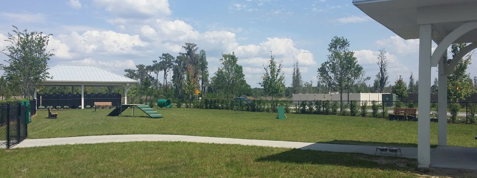 inception-app-prod/ZTM3NzMxYzAtYjU2ZC00NDU5LTgyMTMtZmRiYzVmMDg3MGE3/content/2016/04/Long Lake Dog Park Slide.jpg