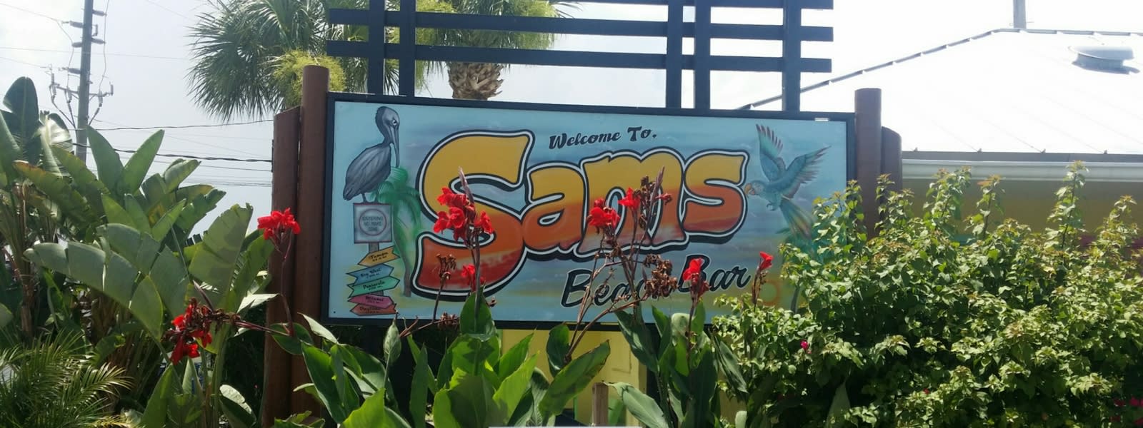 inception-app-prod/ZTM3NzMxYzAtYjU2ZC00NDU5LTgyMTMtZmRiYzVmMDg3MGE3/content/2016/08/Sams Beach Club sign wide.jpg