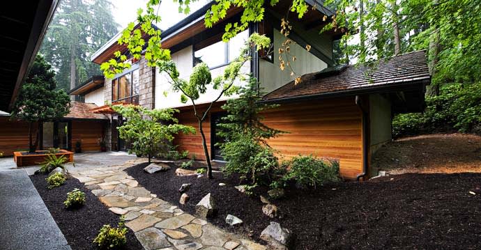 Modern Classics inception-app-prod/ZTVjMTBhZjMtMDA5NC00YjFmLWFmNGEtMjJiZGQ0NTYwODVl/content/2016/08/Green-Modern-Classic-House-by-PLACE-Hidden-in-the-Forest-homesthetics-1.jpg