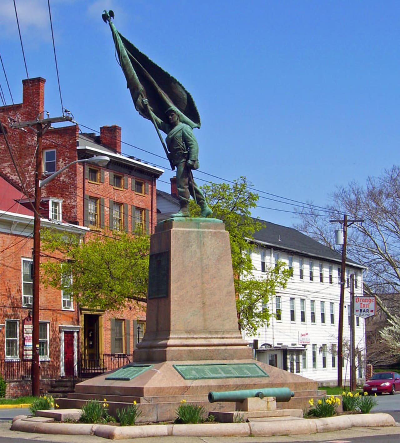 Homes For Sale In Goshen NY inception-app-prod/OGE5YjcwYmMtZjExOC00NGIxLWIzZjAtYTE4MGQxOTRmMjE3/content/2018/02/Orange_Blossoms_statue%2C_Goshen_NY.jpg