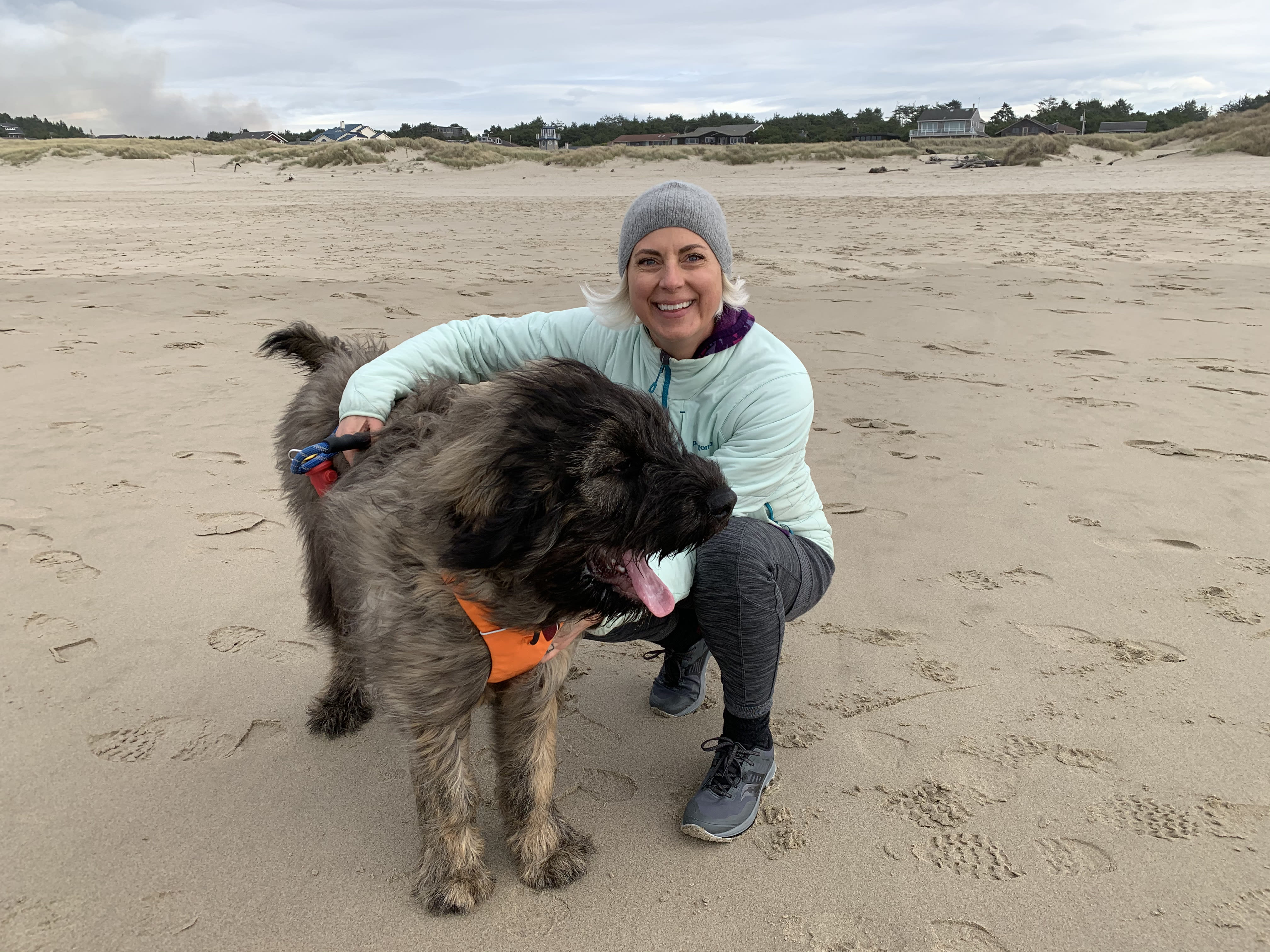 Meadow Davis and her dog Jammy on the Beach