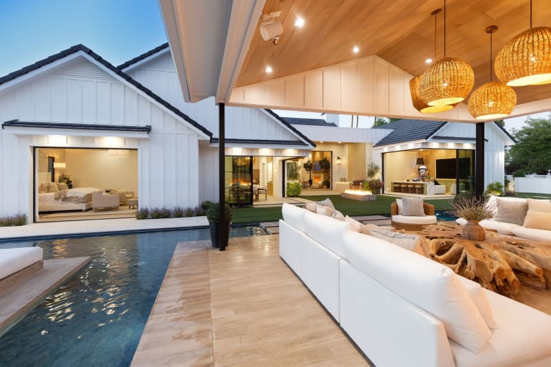 A luxury outdoor living space at dusk
